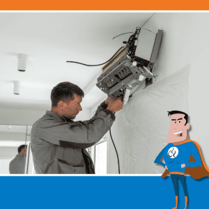 A prosolutions service technician works on a mini-split AC system. 